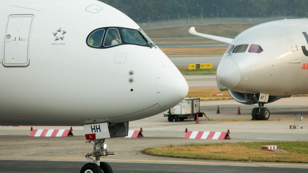 Man arrested after opening plane’s door, walking on wing, climbing down on tarmac: Officials