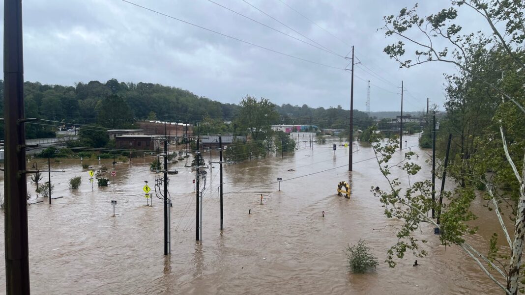 No time for shoes as Asheville family flees by boat, fearing they lost everything