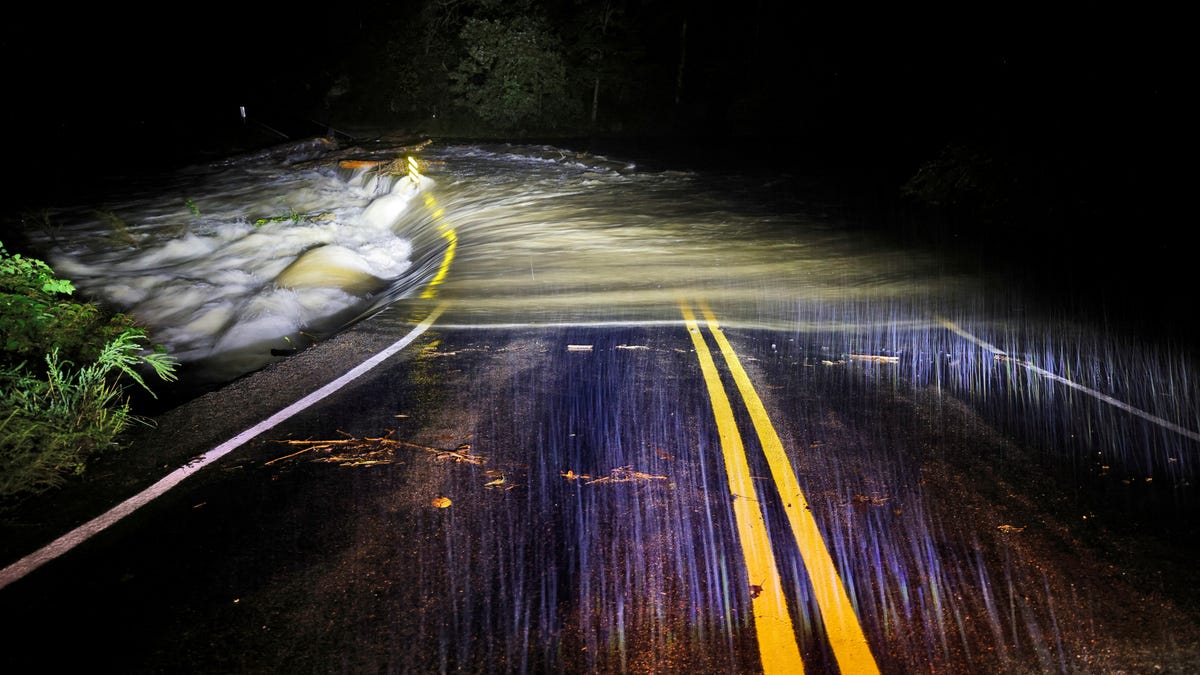 North Carolina floods: Lake Lure Dam overtops with water, but remains in tact, officials say