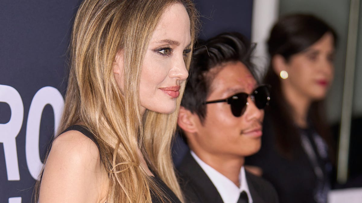 Angelina Jolie and Brad Pitt’s son Pax has facial scars in rare red carpet appearance