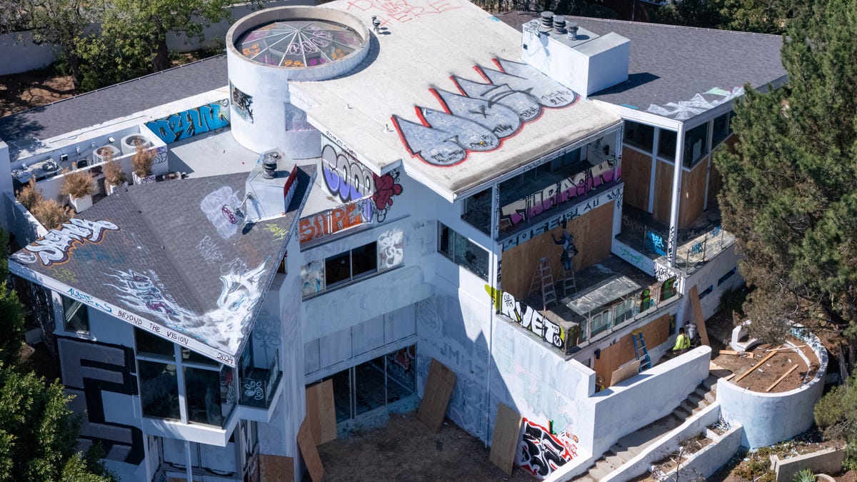 Squatters graffiti second vacant LA mansion owned by son of Philadelphia Phillies owner