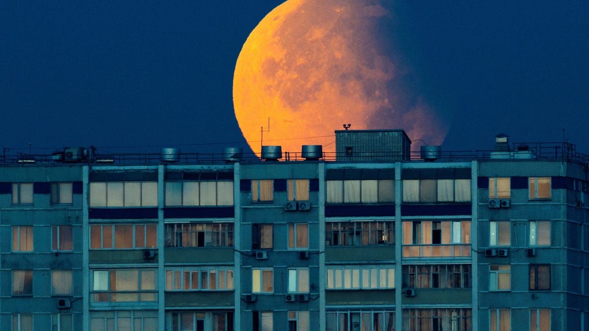 Partial lunar eclipse occurs during Harvest supermoon: See the stunning photos