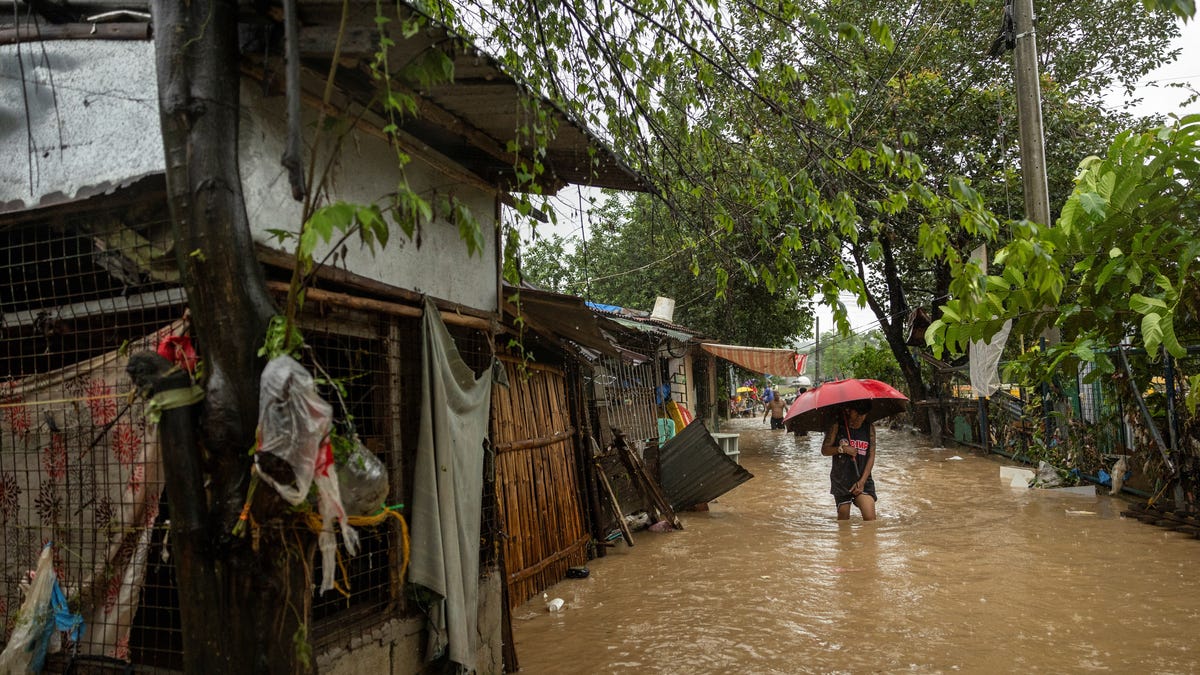 Multiple dead in Philippines after tropical storm triggers flooding, landslides