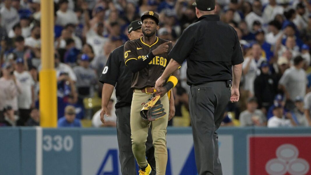 Padres-Dodgers playoff game spirals into delay as Jurickson Profar target of fan vitriol