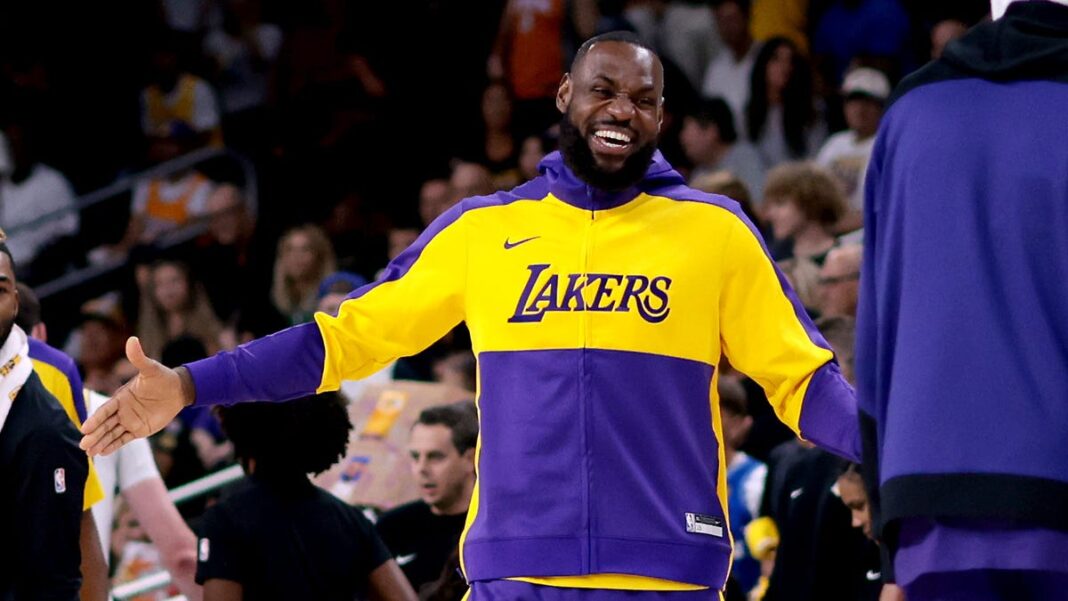 LeBron James, Lakers look highly amused as fan is forcibly removed from arena