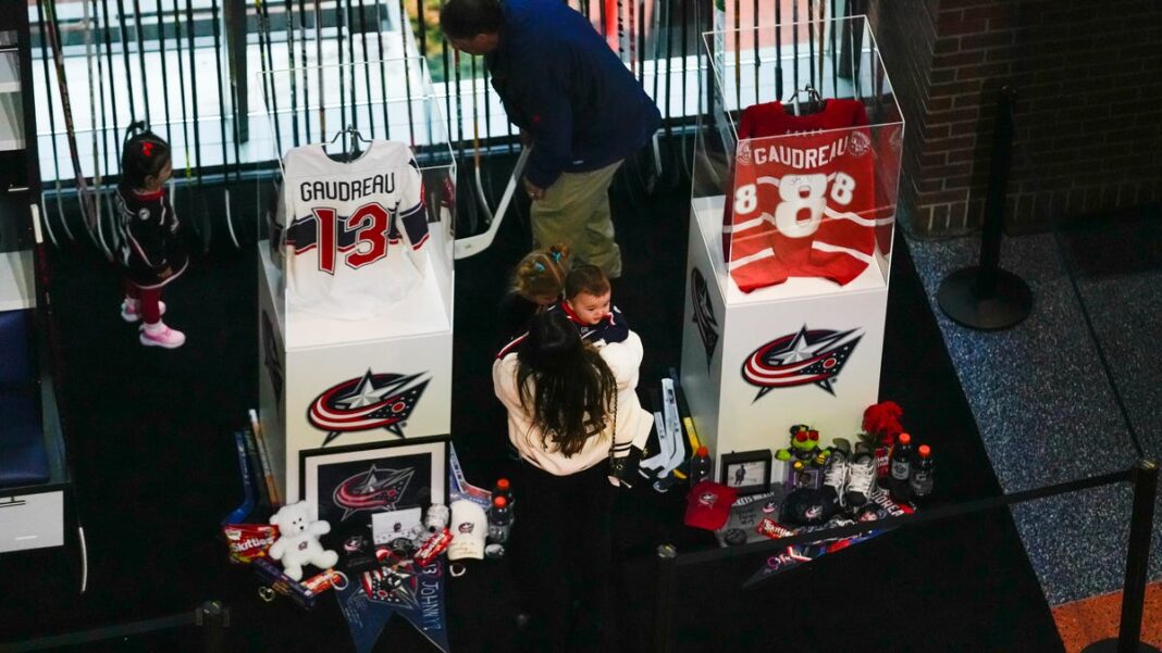 Columbus Blue Jackets memorialize Johnny Gaudreau, hoist ’13’ banner