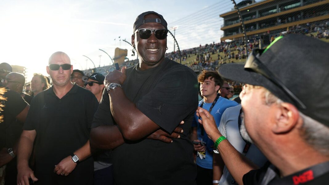 Michael Jordan celebrates as his driver Tyler Reddick makes NASCAR Championship Race