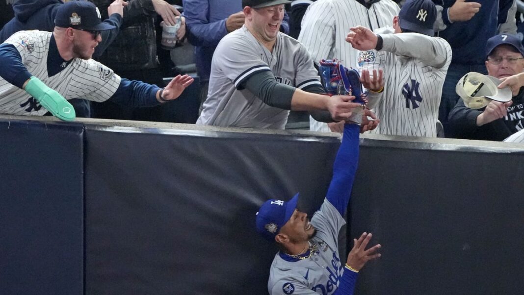 WATCH: Yankees fans try to rip ball from Mookie Betts’ glove in World Series Game 4