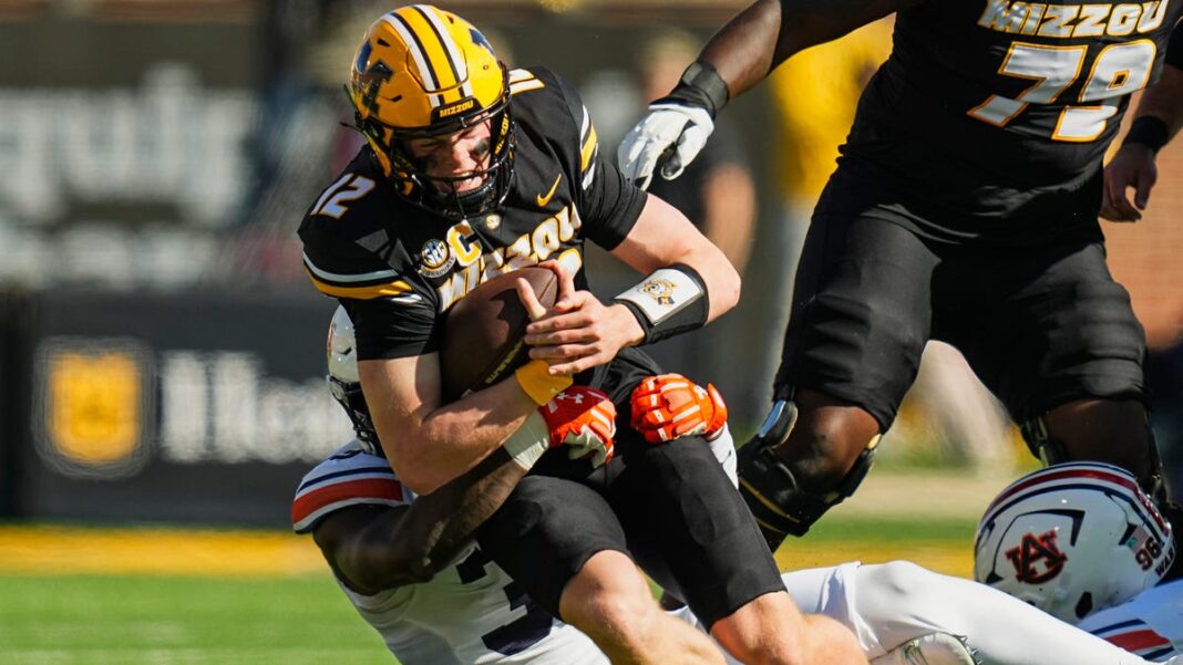 Missouri quarterback Brady Cook goes from hospital to defeating Auburn in one wild afternoon