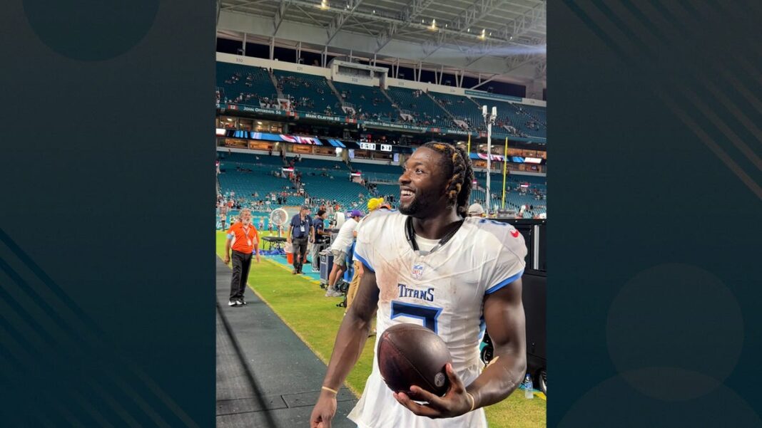 Watch Tennessee Titans running back Tyjae Spears give a fan the gift of a lifetime