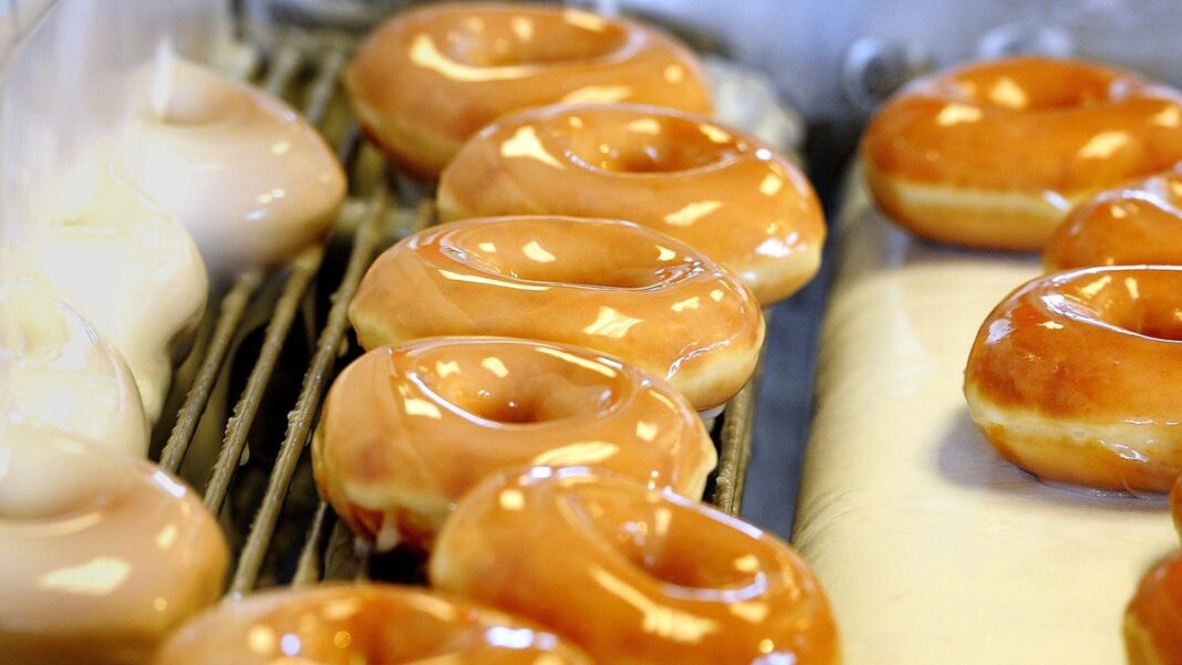 Krispy Kreme is giving free dozens to early customers on World Kindness Day