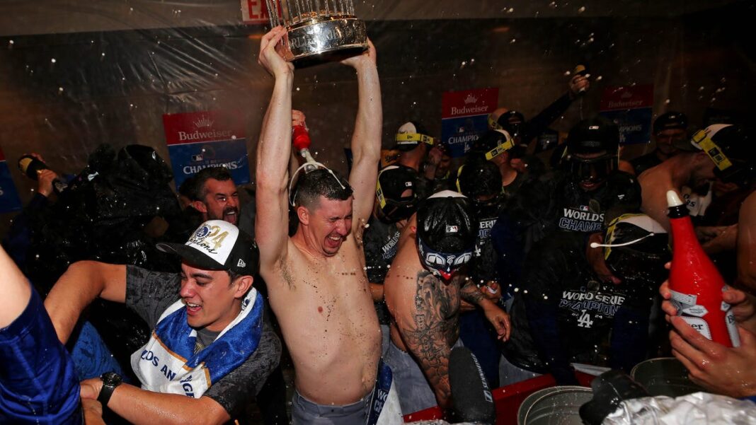 Walker Buehler chugs beer bong wearing Orel Hershiser jersey during Dodgers parade