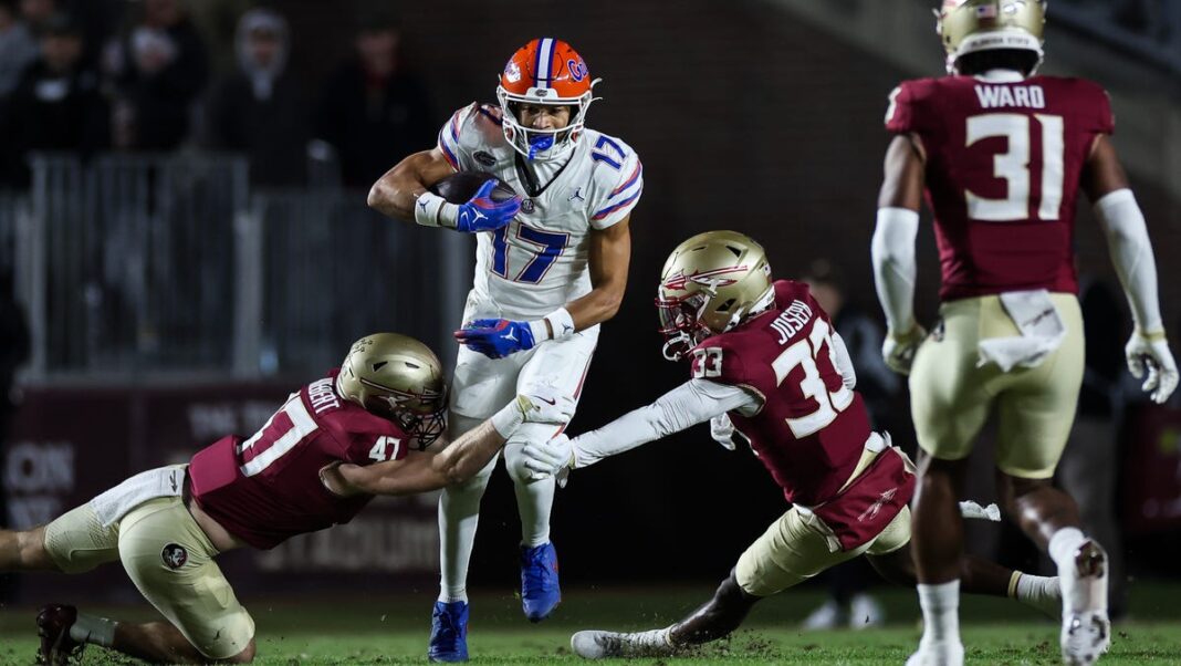 Florida, FSU football teams fight after Gators attempt to plant flag after rivalry win