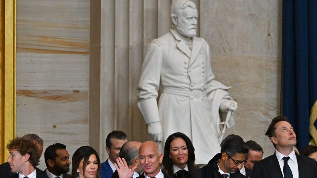 The three richest Americans sat together at the Trump inauguration. Is that a problem?