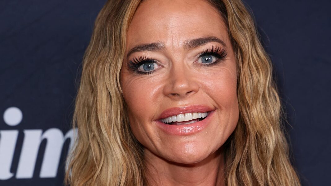 Denise Richards ‘ruptured’ her breast implants after jumping off bridge on reality show